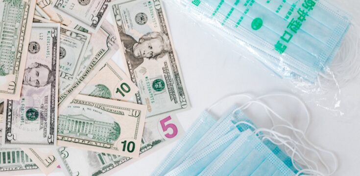 dollar-bills-and-healthcare-masks
