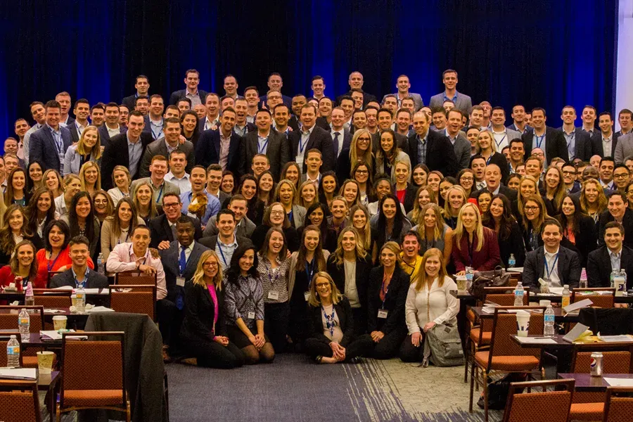 group photo of dozens of people